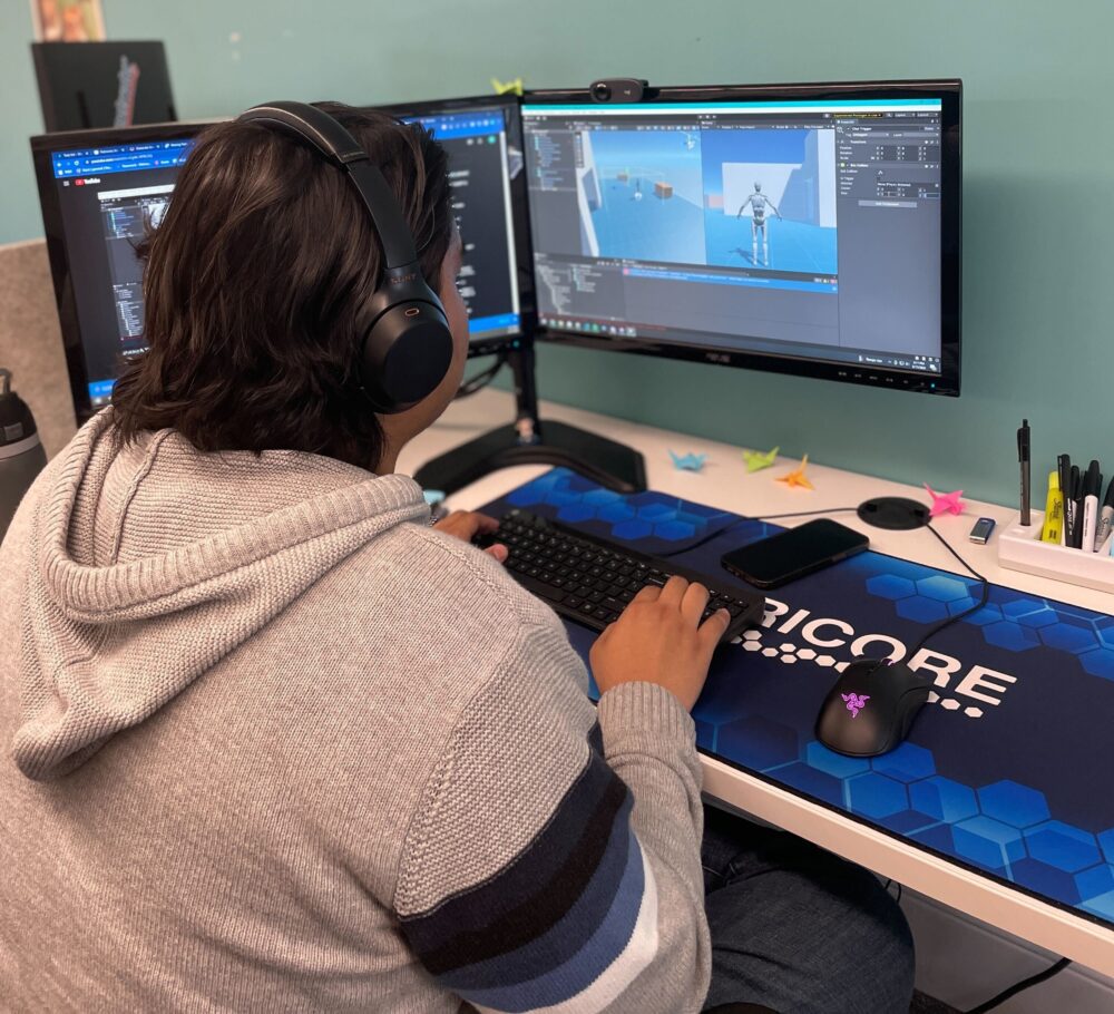 Software Developer Sean working with AI tools for the AI Jam.